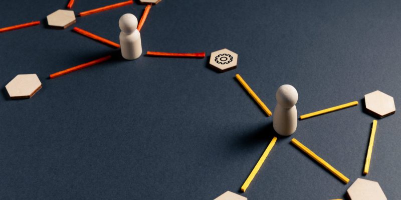 Conceptual image of network access control with central node managing connections between groups, representing system governance, monitoring, and digital infrastructure.